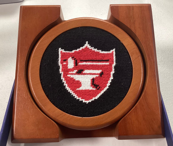 Coasters with hand-stitched shield