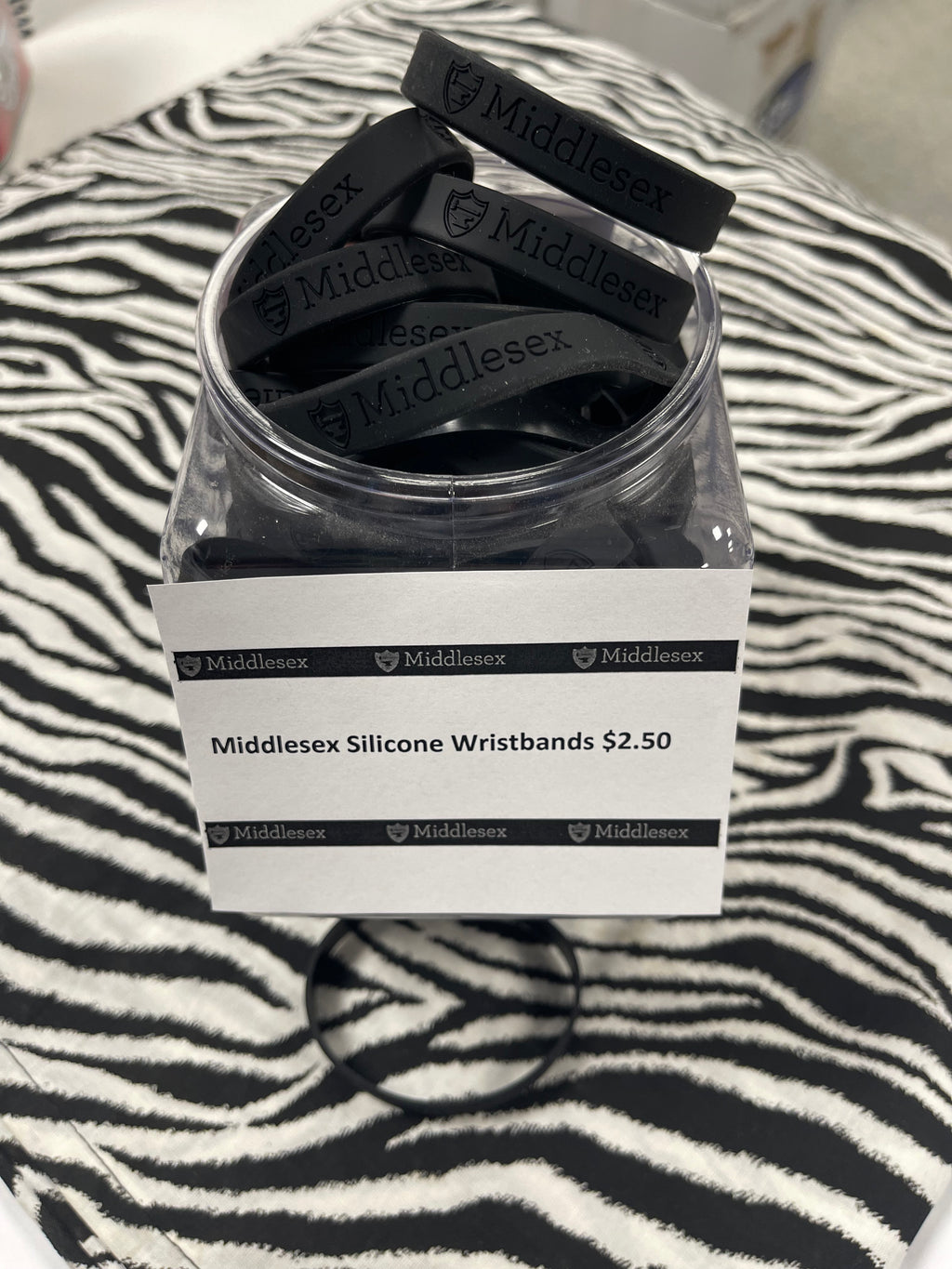 Middlesex Silicone Wristband, Black with debossed Middlesex logo