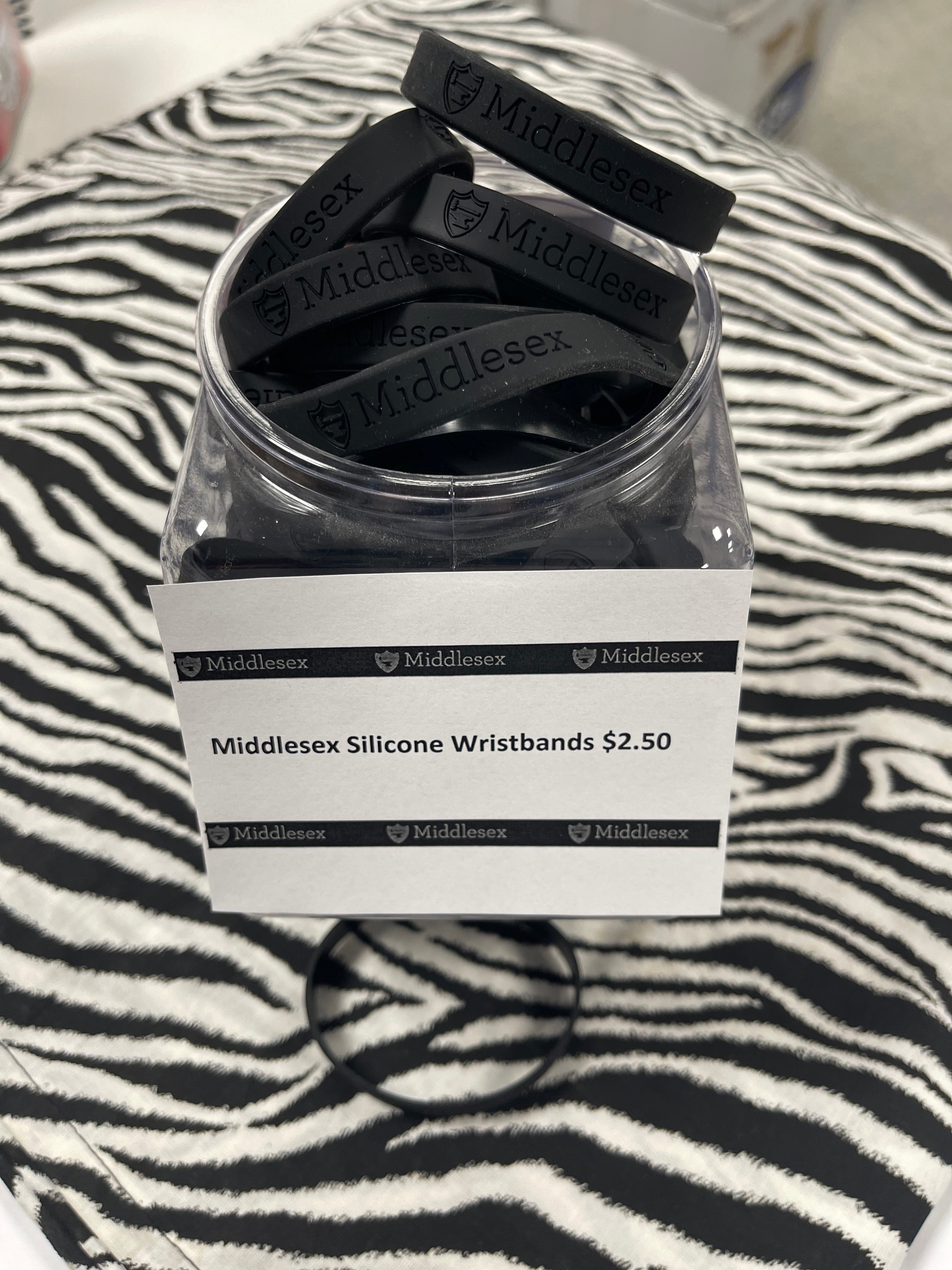 Middlesex Silicone Wristband, Black with debossed Middlesex logo